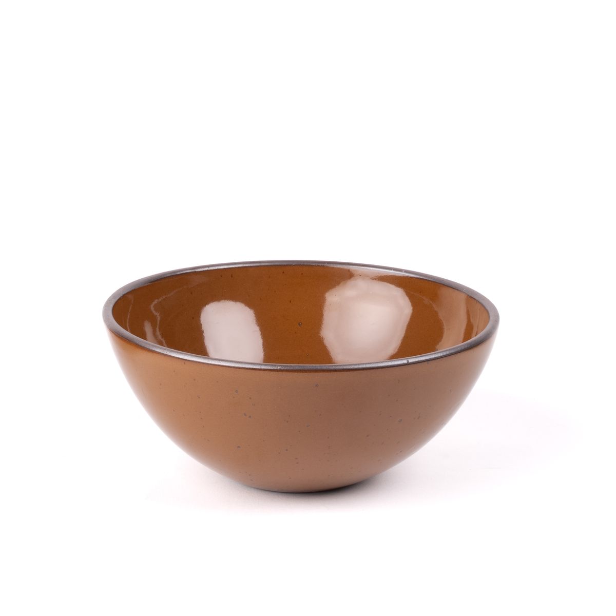 A large rounded ceramic bowl in a glossy caramel brown color featuring iron speckles and an unglazed rim
