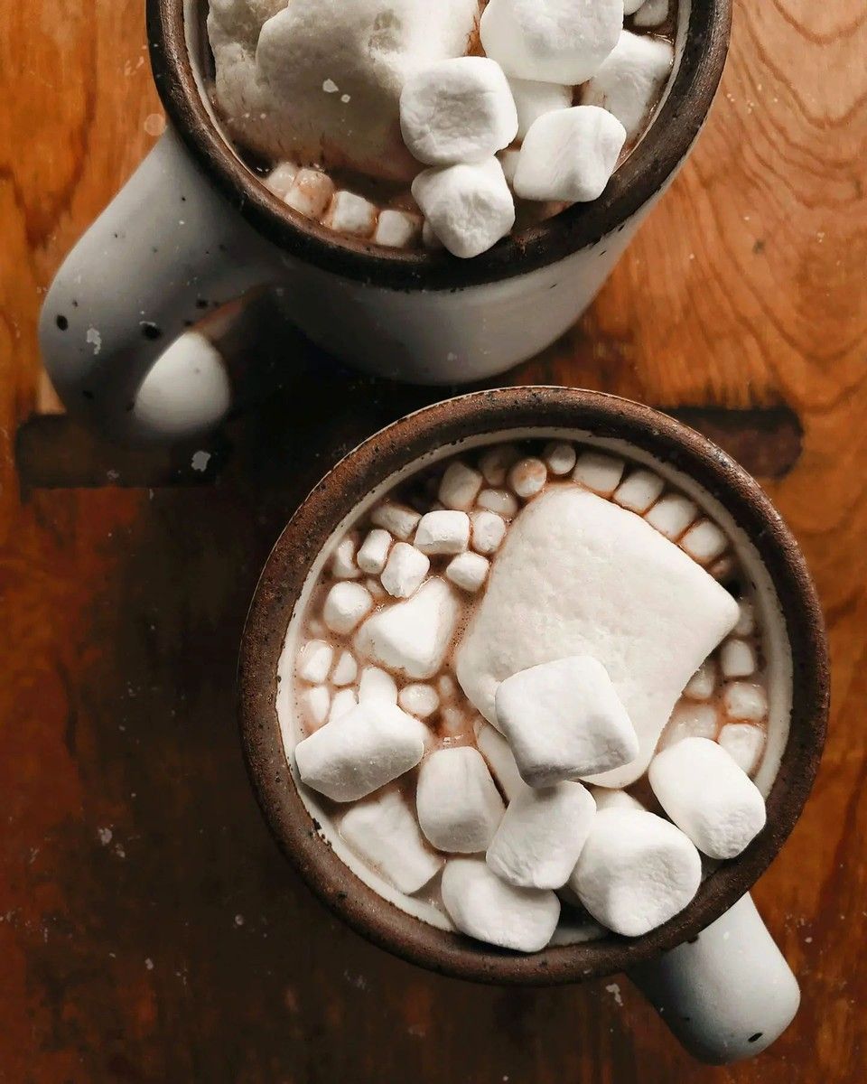Two East Fork Mugs photographed from overhead to reveal a mug full of hot chocolate and many, many marshmallows.