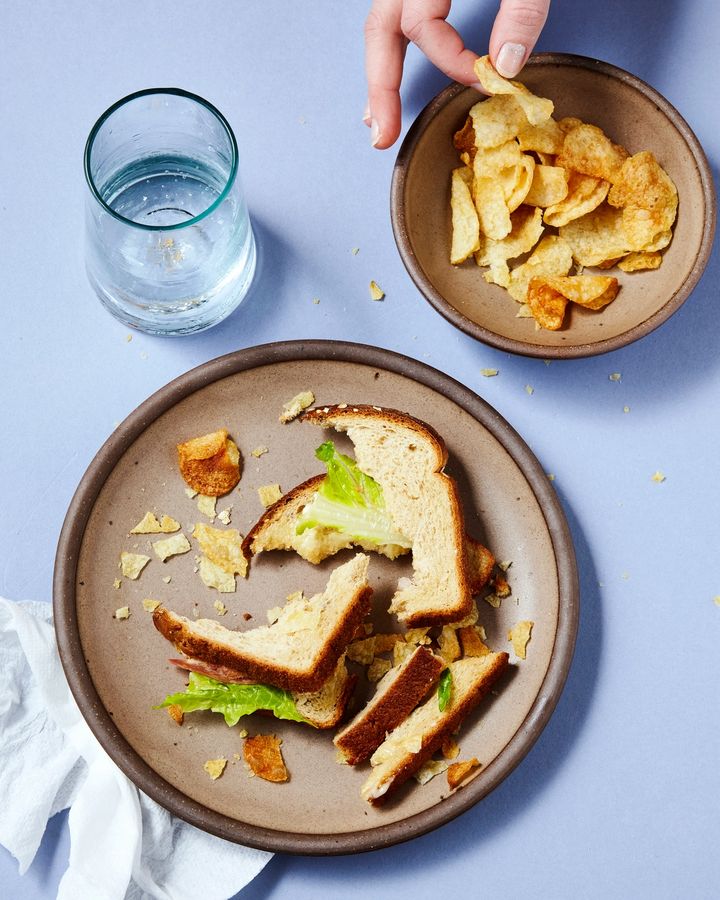 Dinner Plate with Half Eaten Sandwich