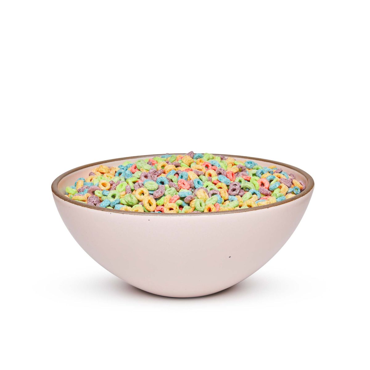 A large ceramic mixing bowl in a soft light pink color featuring iron speckles and an unglazed rim, filled with cereal