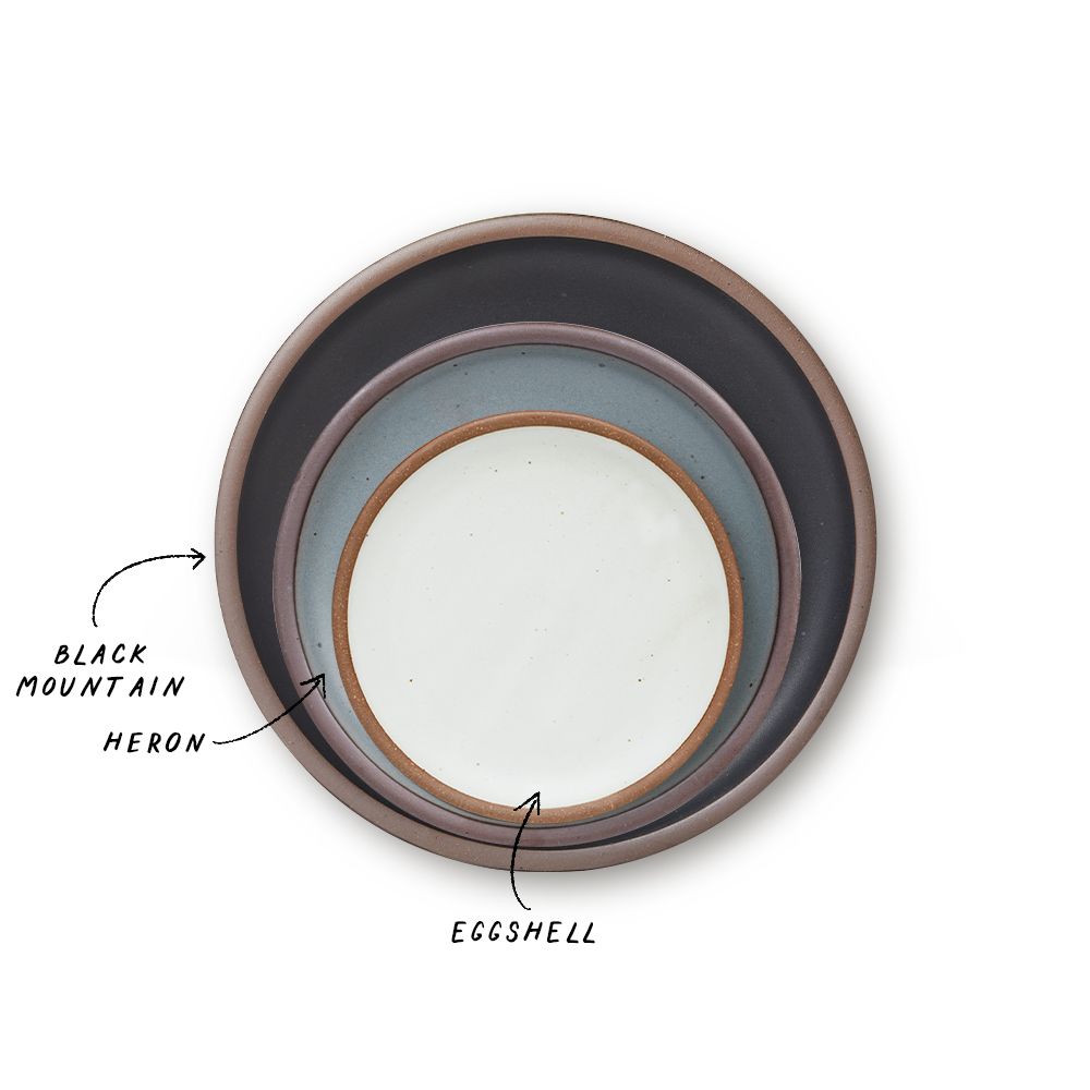 A stack of 3 plates in Dinner, Side, and Cake sizes in a graphite black, blue-grey, and cool white colors.