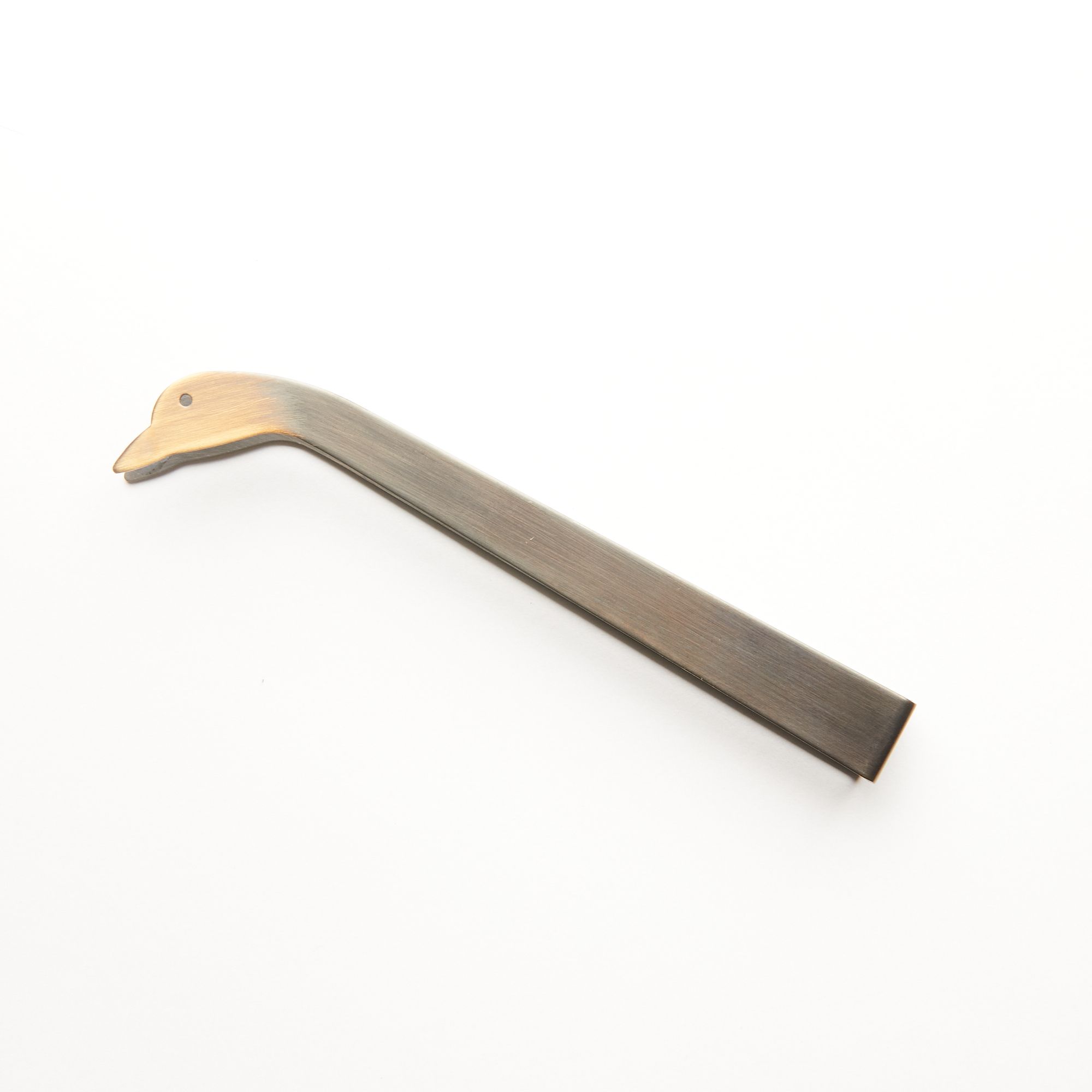 Simple steel clamp candle snuffer with a tip that is a duck head silhouette with eyes