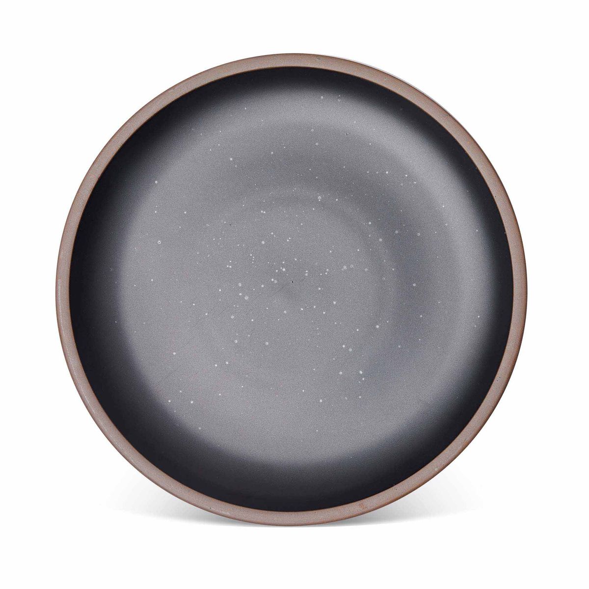 A large ceramic platter in a graphite black color featuring iron speckles and an unglazed rim.