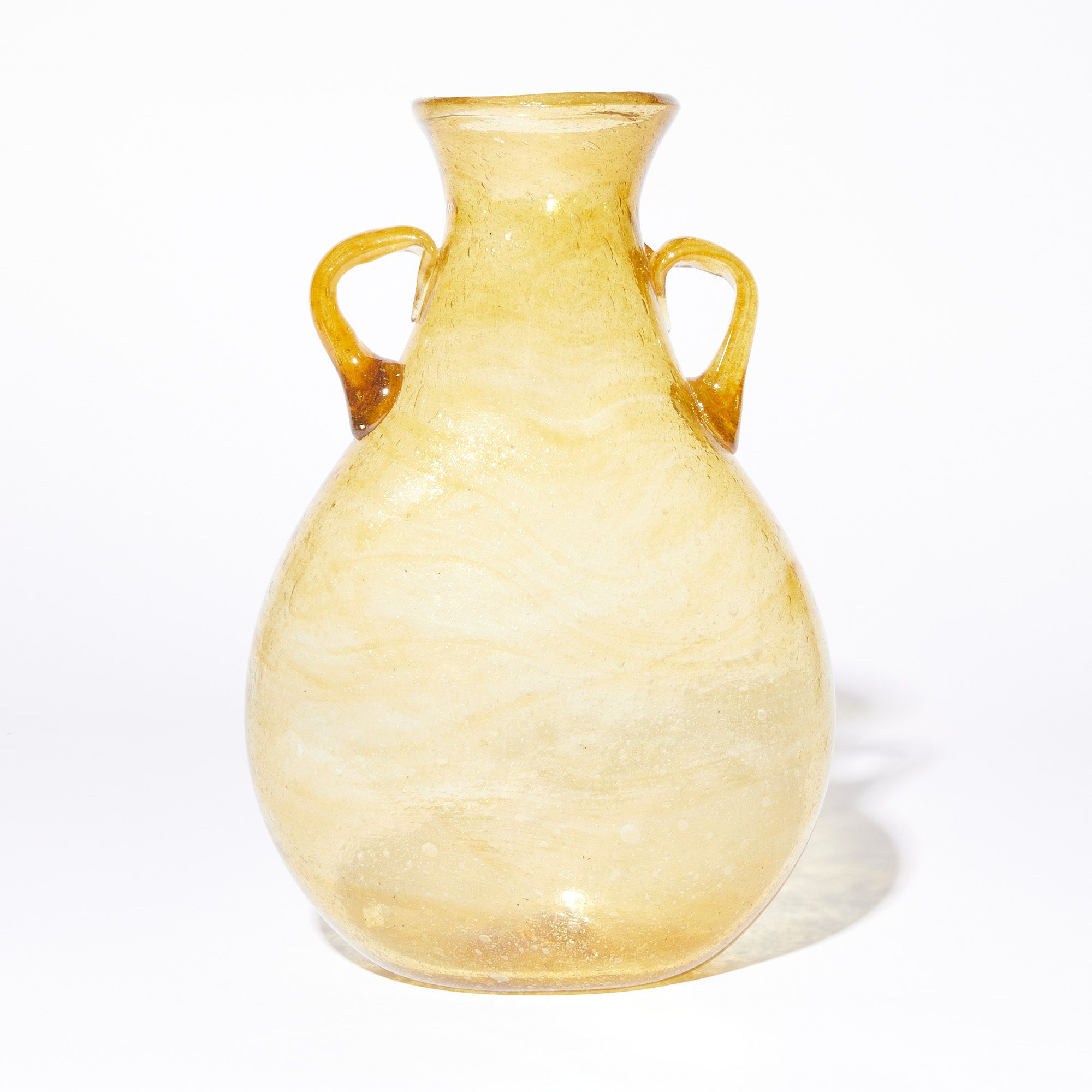 translucent yellow vase, narrowing at the top with two small handles