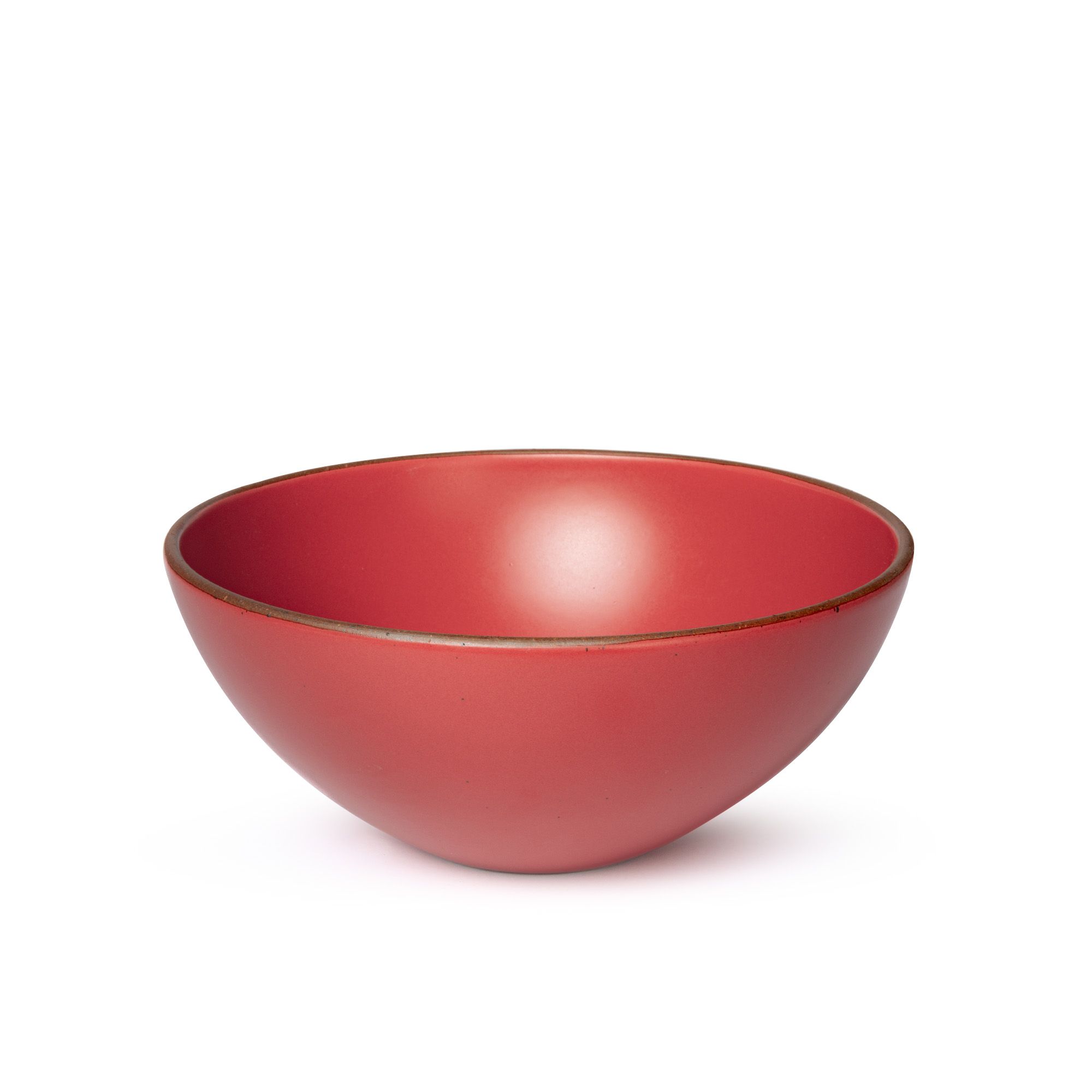 A large ceramic mixing bowl in a bold red color featuring iron speckles and an unglazed rim