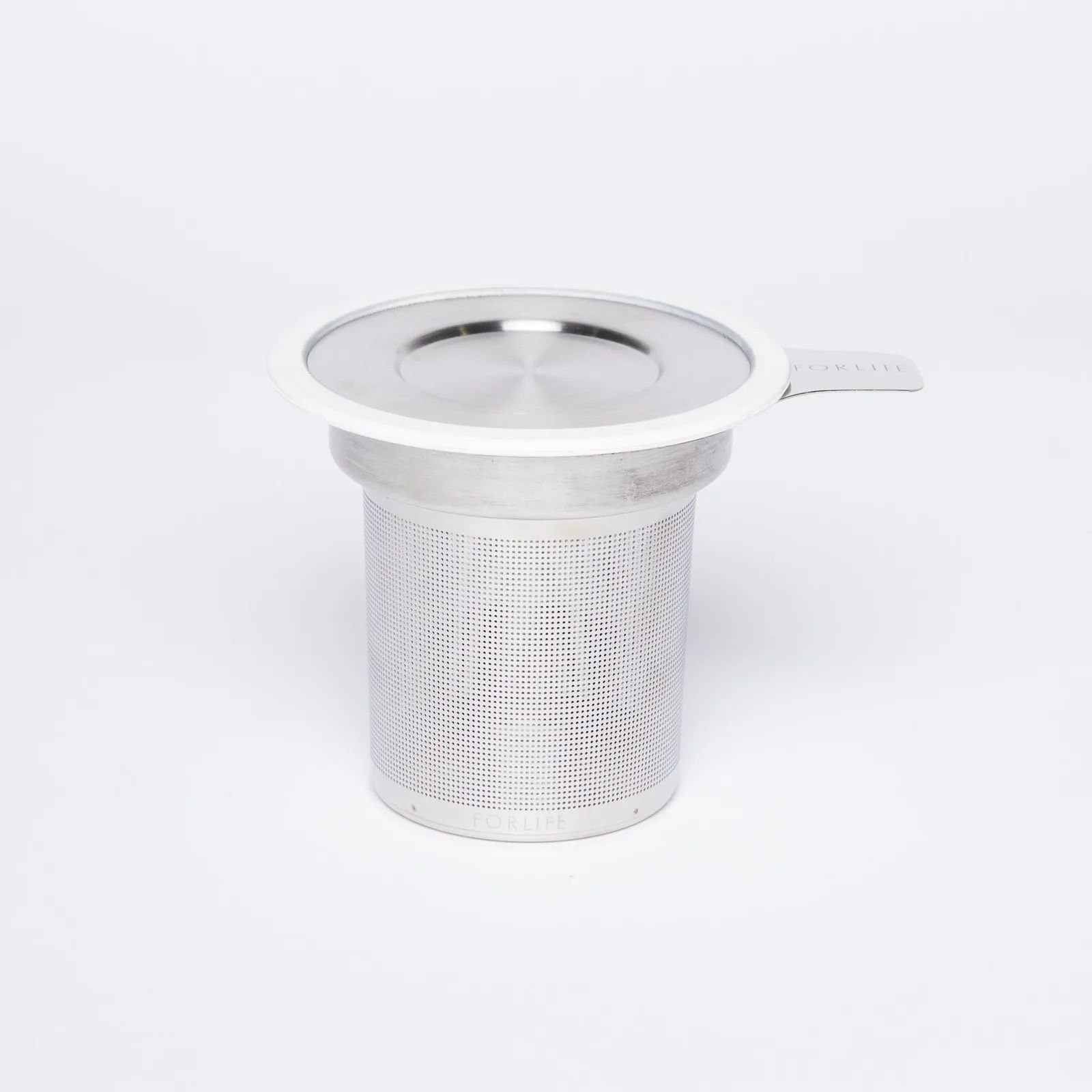 A stainless steel strainer that fits into the East Fork Big Mug