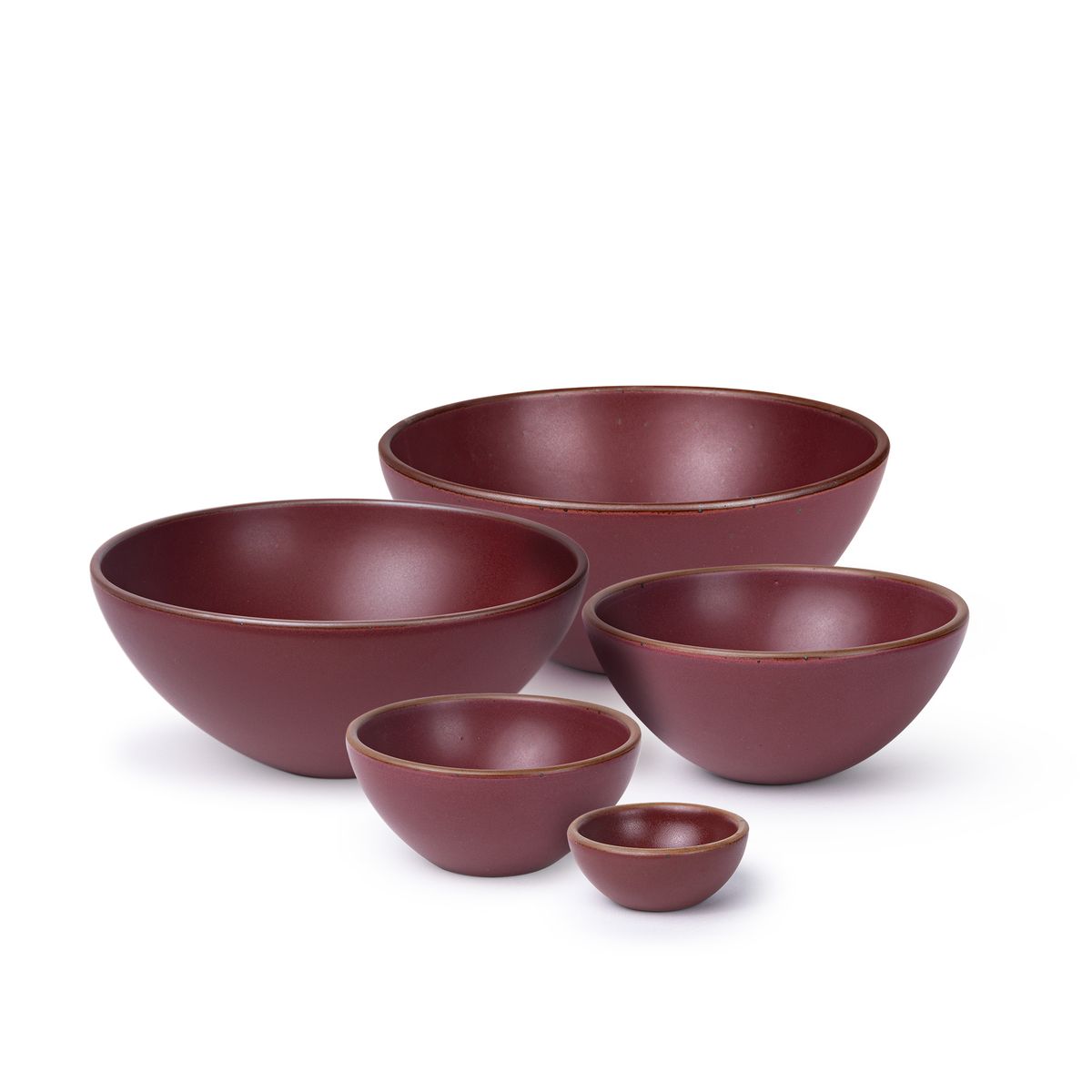 A bitty bowl, ice cream bowl, soup bowl, popcorn bowl, and mixing bowl in a plum color featuring iron speckles