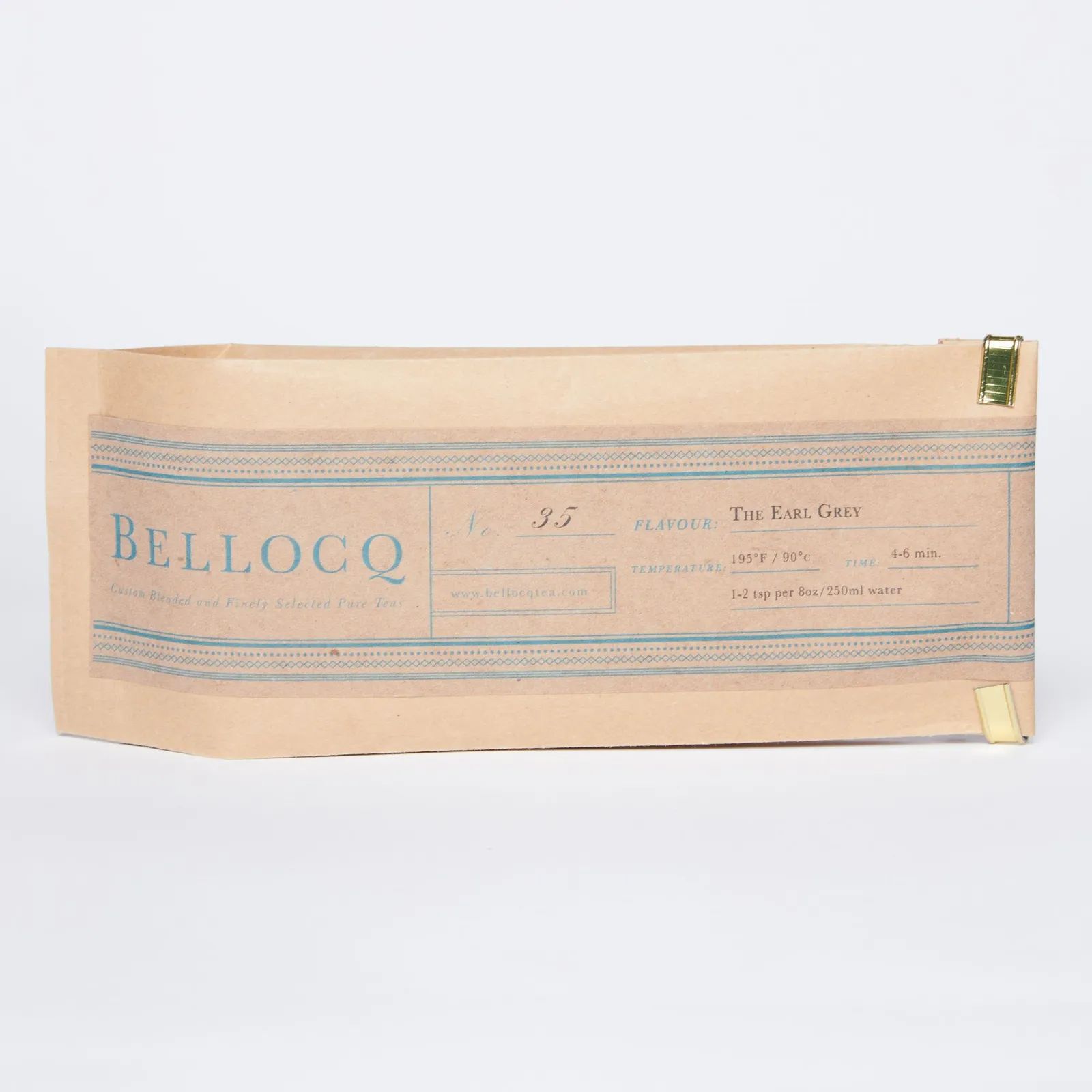 A tan bag of Earl Grey tea with blue writing and design