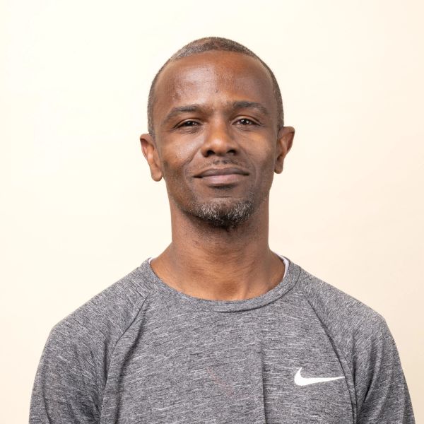 A headshot of Andre W.