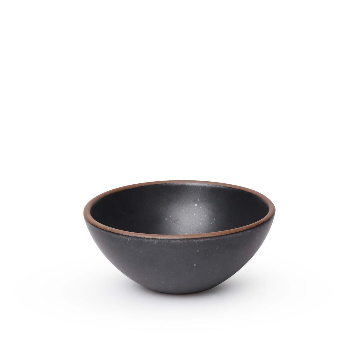 A medium rounded ceramic bowl in a graphite black color featuring iron speckles and an unglazed rim