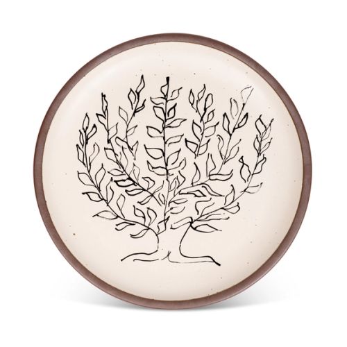 A large serving platter in a warm off-white color with unglazed rim with a black decal of the artwork, Le Platane, from Henri Matisse.