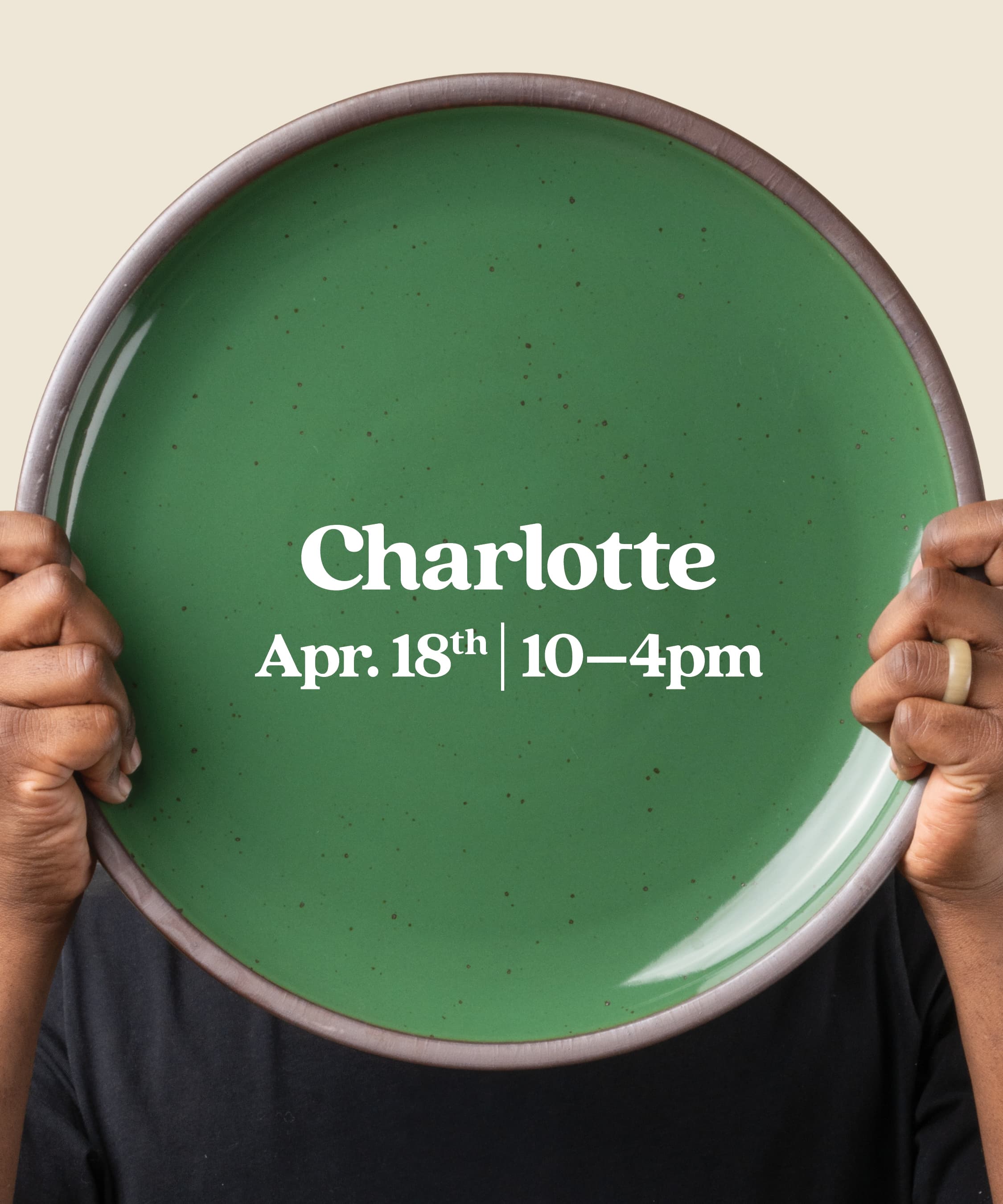 Hands hold up a large oval platter in a glossy green color with text overlay that reads 'Charlotte Apr. 18th 10-4pm."