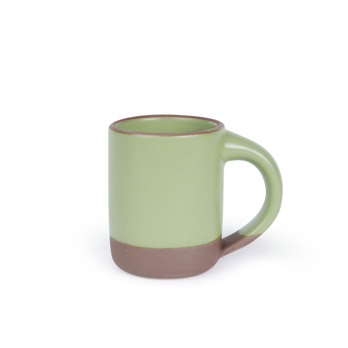 A medium sized ceramic mug with handle in a calming sage green color featuring iron speckles and unglazed rim and bottom base.