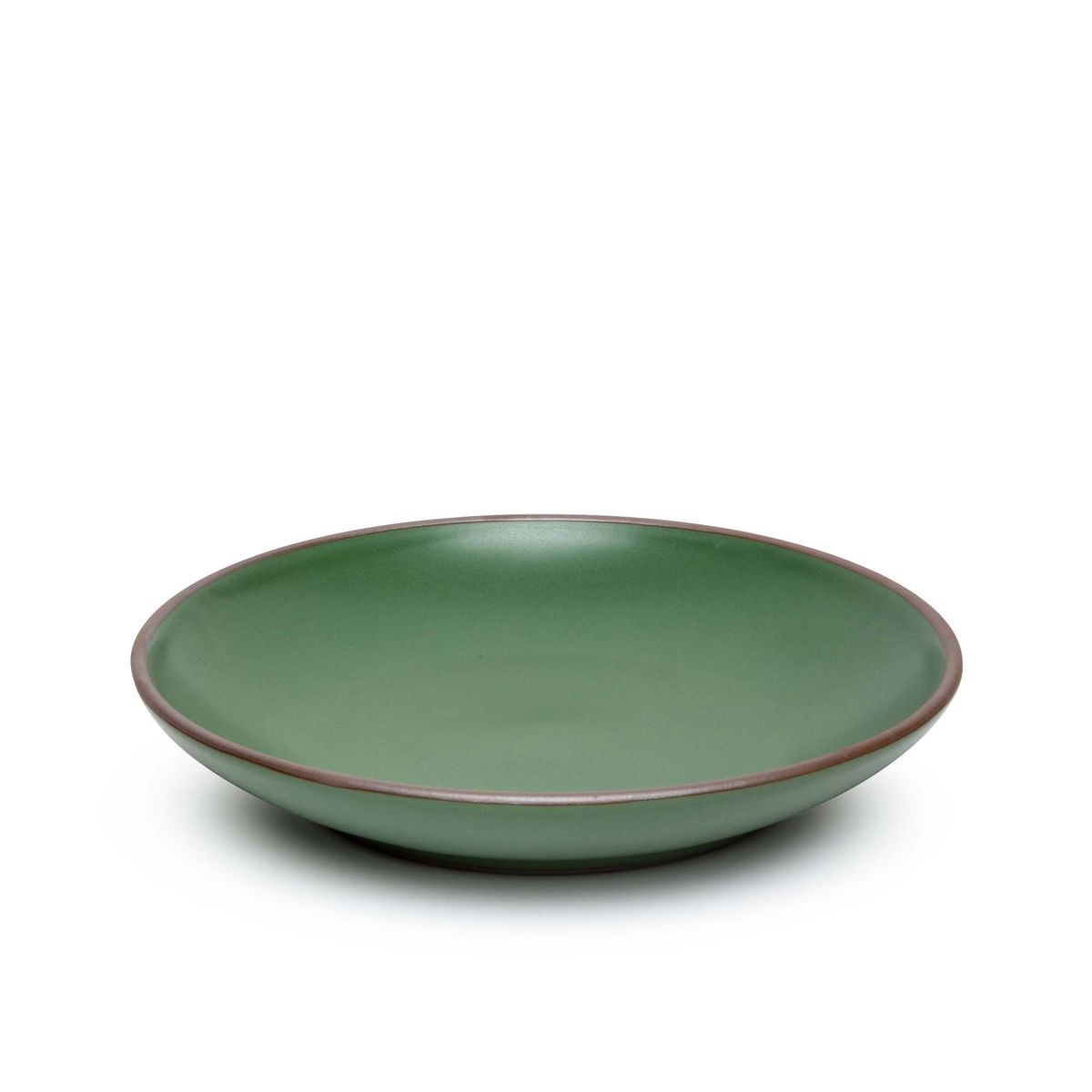 A large ceramic plate with a curved bowl edge in a deep, verdant green color featuring iron speckles and an unglazed rim.