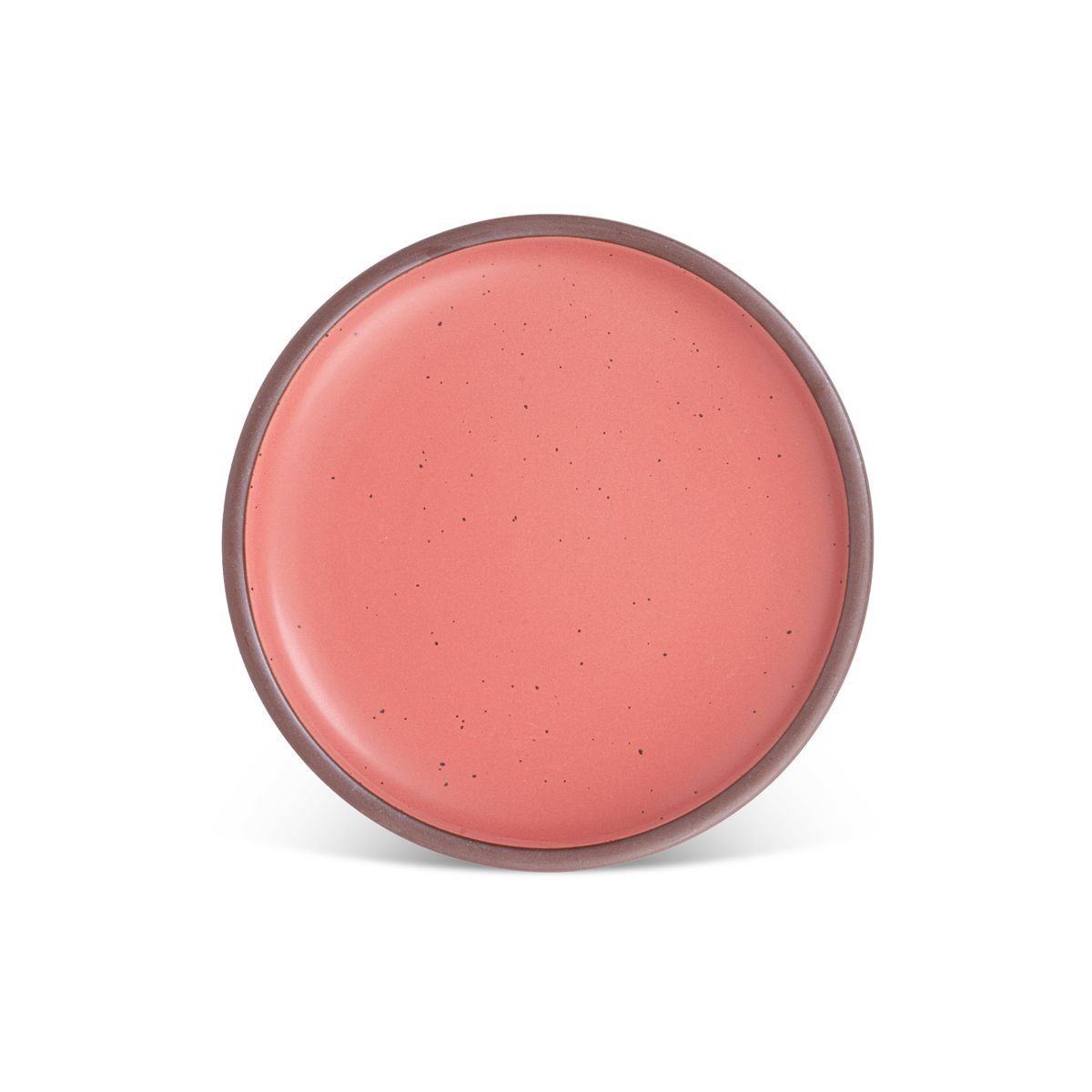 A dinner sized ceramic plate in a watermelon pink color featuring iron speckles and an unglazed rim