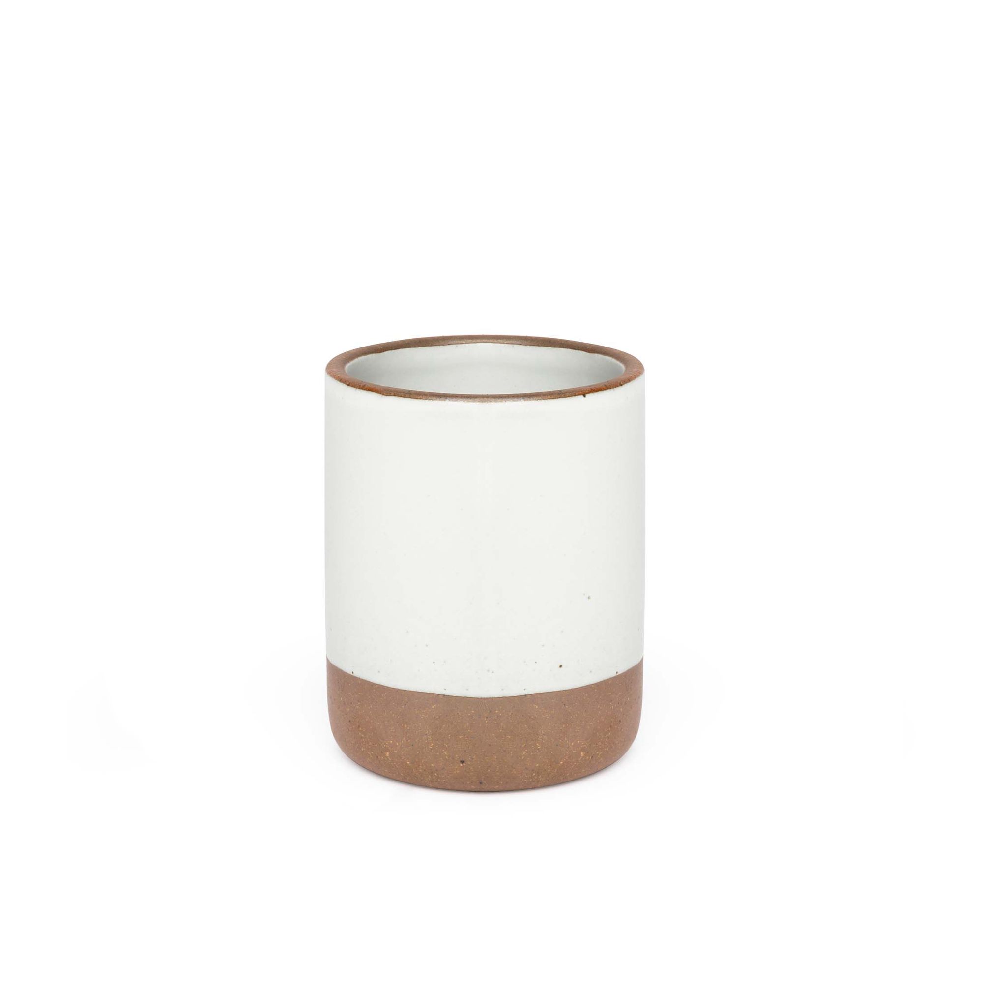 A medium sized ceramic vessel in a cool white color featuring iron speckles and unglazed rim and bottom base.
