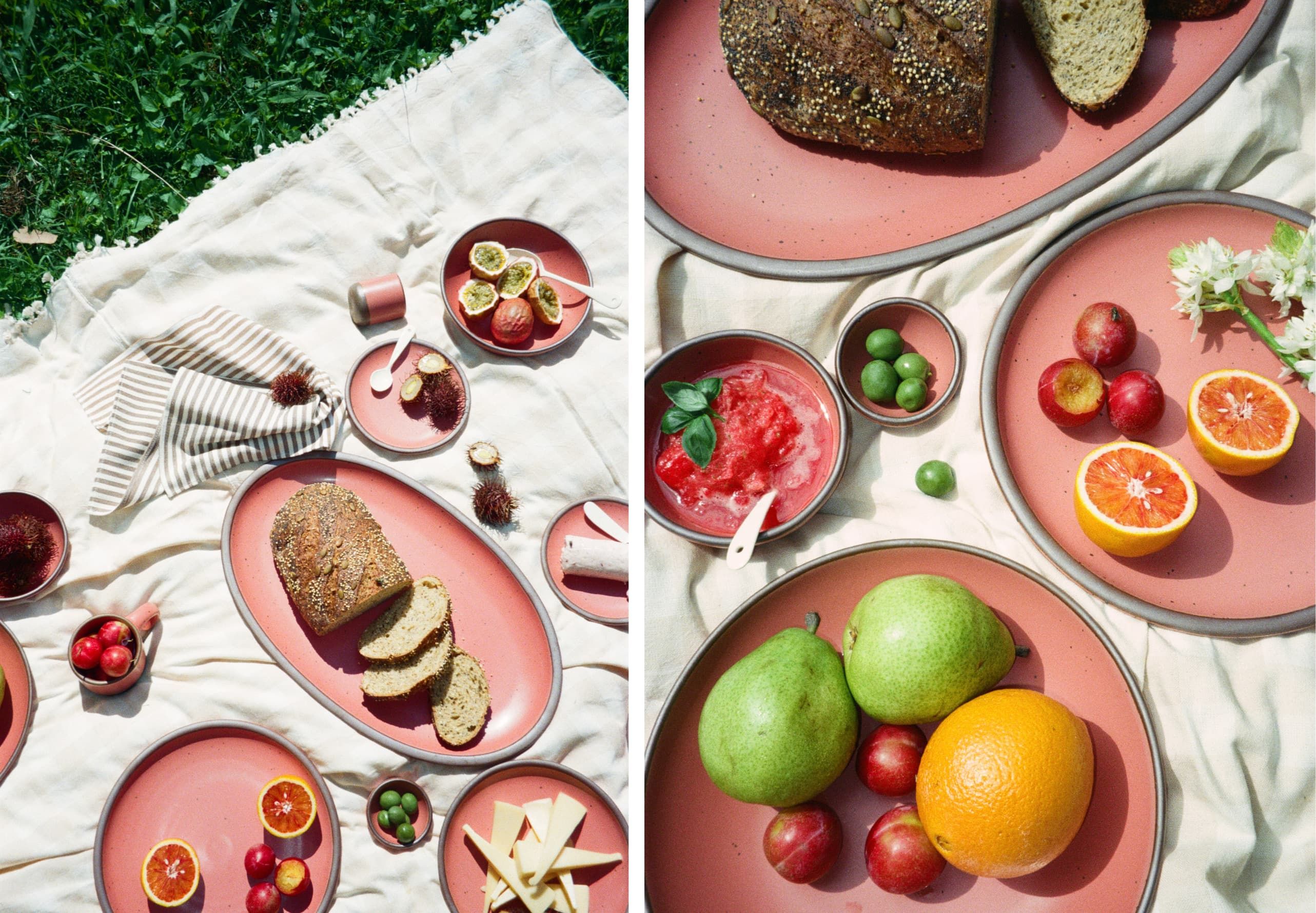Two photos of a picnic scene with fresh fruit, bread, and cheese arranged on pink plates over a white blanket on green grass.