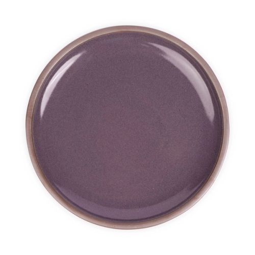 A large ceramic platter in a purple color with a soft glowing sheen, iron speckles and an unglazed rim.