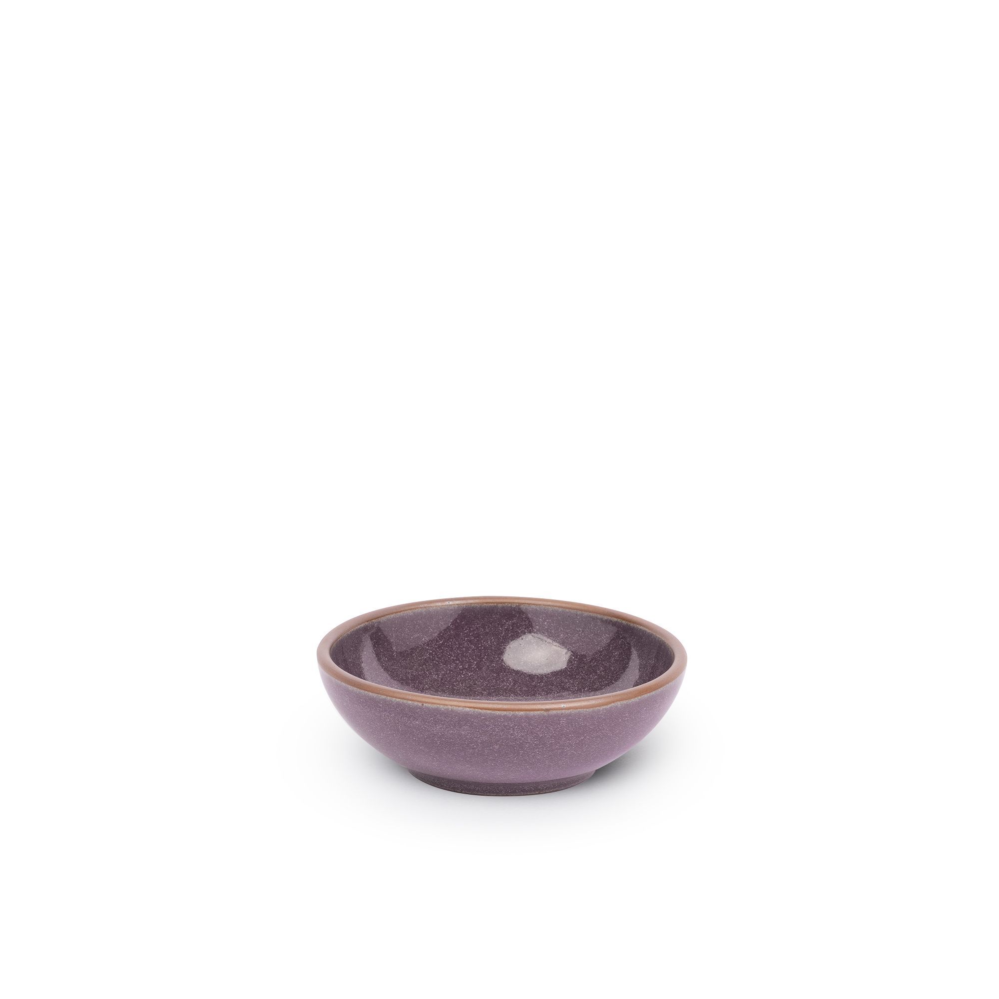 A small shallow ceramic bowl in a purple color with a soft glowing sheen and an unglazed rim