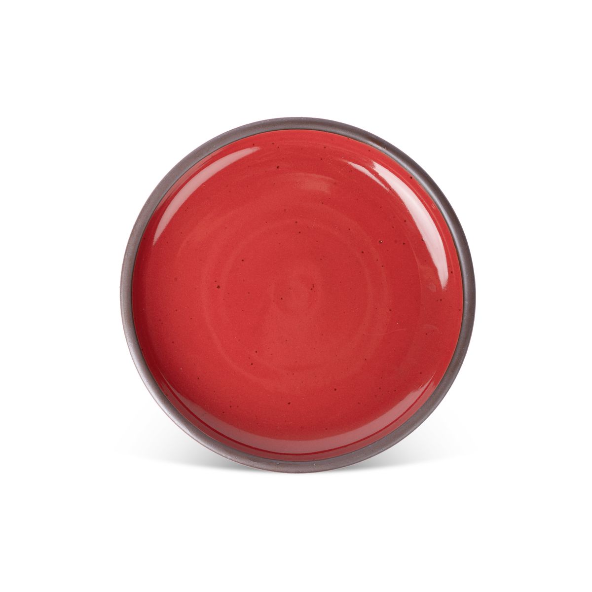 A dinner sized ceramic plate in a glossy caramel brown color featuring iron speckles and an unglazed rim