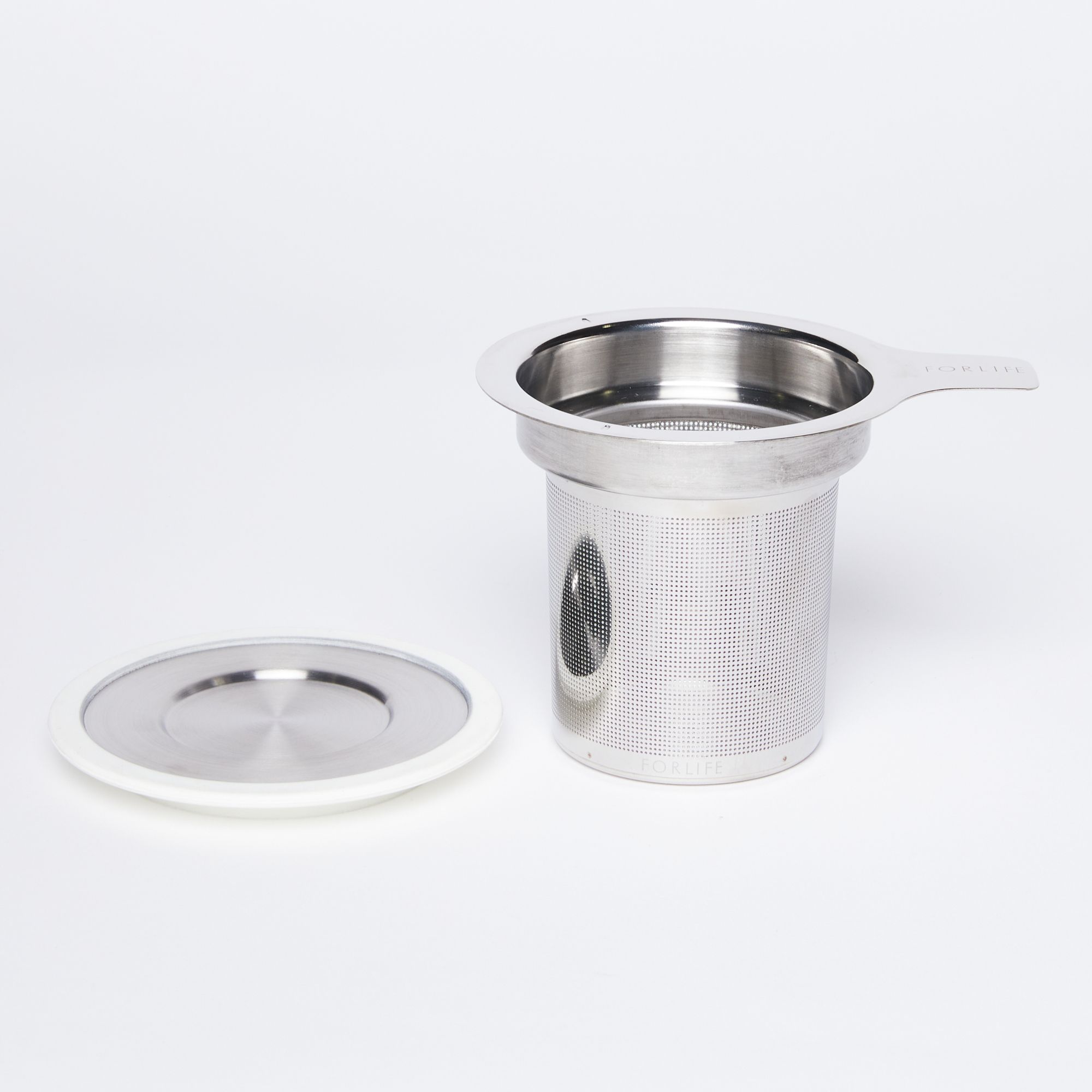 Extra-fine stainless-steel infuser with cylinder base and white silicone lined steel top on the side