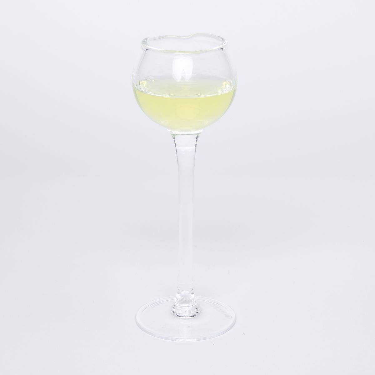 small bulb on top of glass stem filled with limoncello