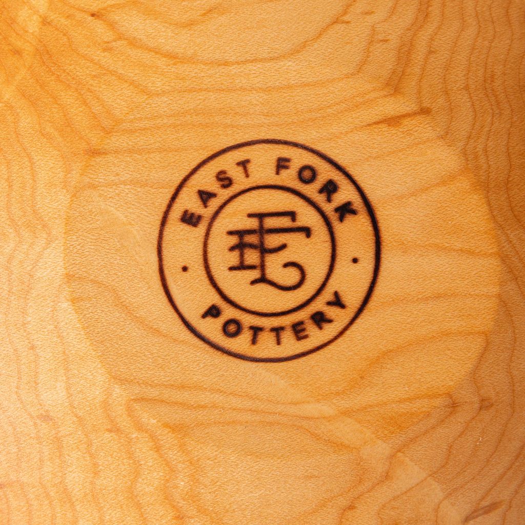Close up of engraved stamp on bottom of the bowl that reads 'East Fork Pottery' and the East Fork logo.