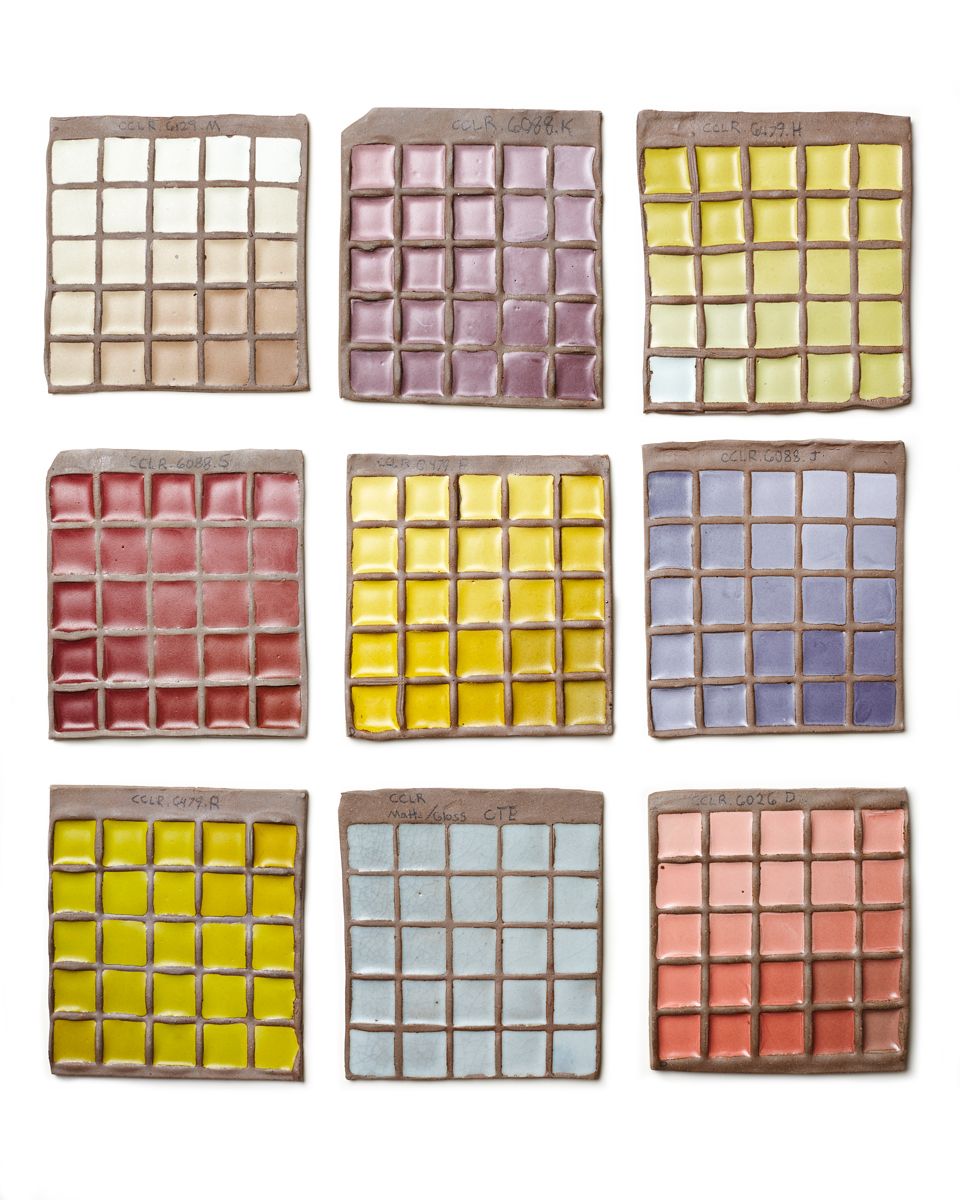 9 glaze test grids with different test colors on each grid (White to brown on one grid, yellow on 3 grids, blue on 2 grids, reds and purples on three grids)