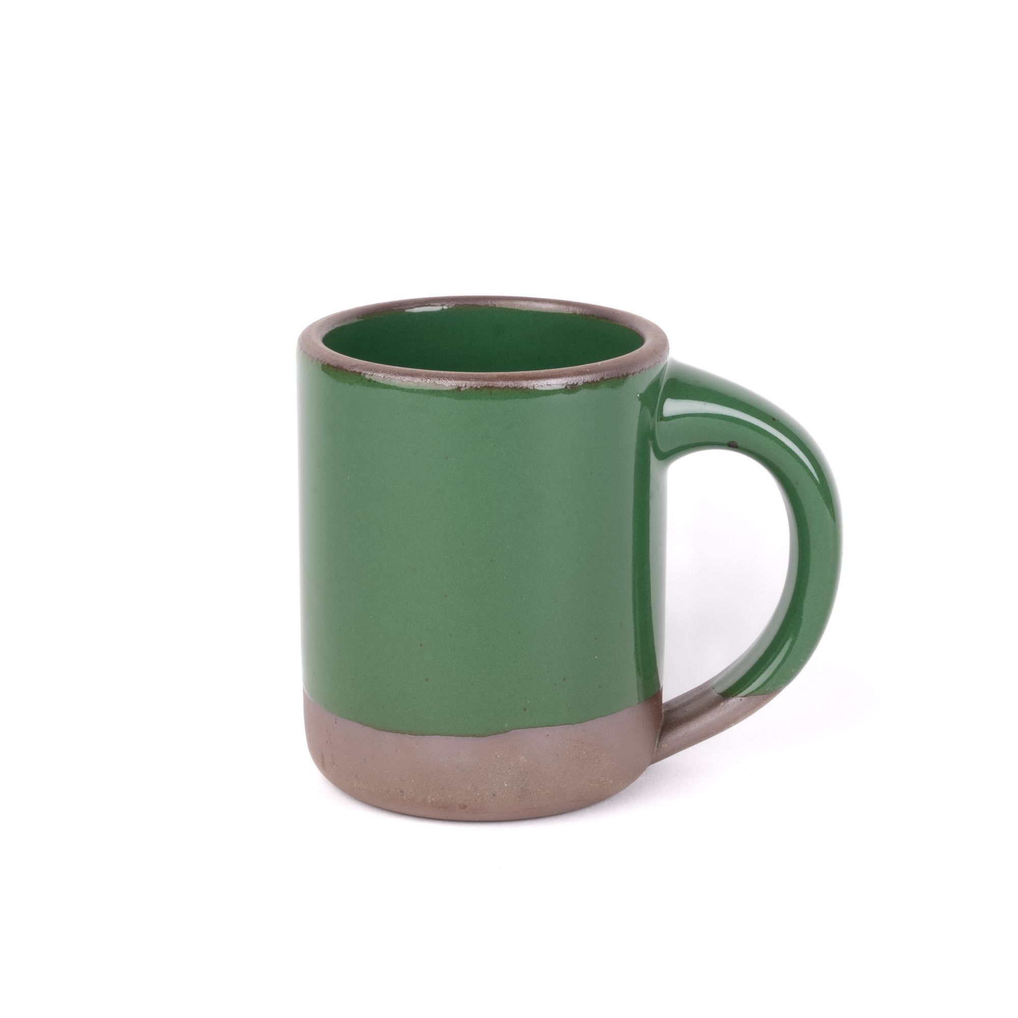 A big sized ceramic mug with handle in a glossy emerald green color featuring iron speckles and unglazed rim and bottom base.