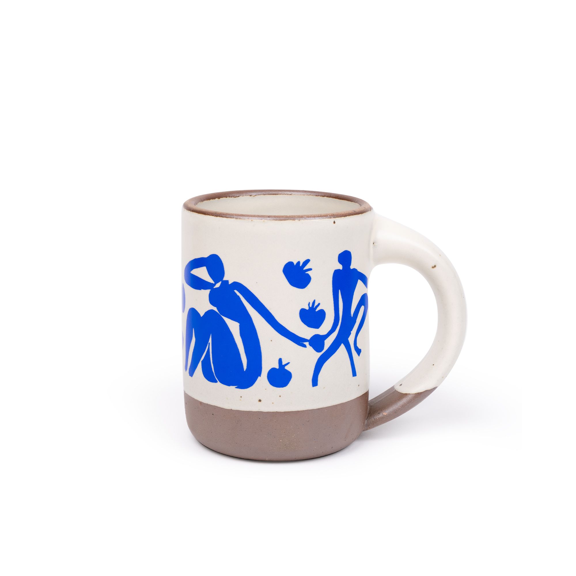 Bright blue, abstract cut-out figures of women sitting, monkeys, and pomegranate across a white, ceramic glazed mug with a brown, unglazed rim and bottom.