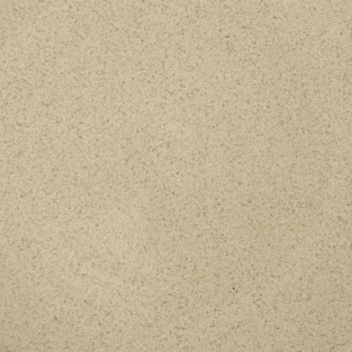 A closeup of a ceramic plate in a reflective dappled grey-green color