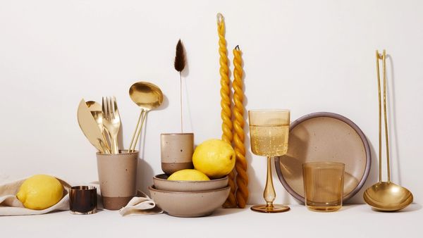 Morel pots with lemons, glassware and brass flatware
