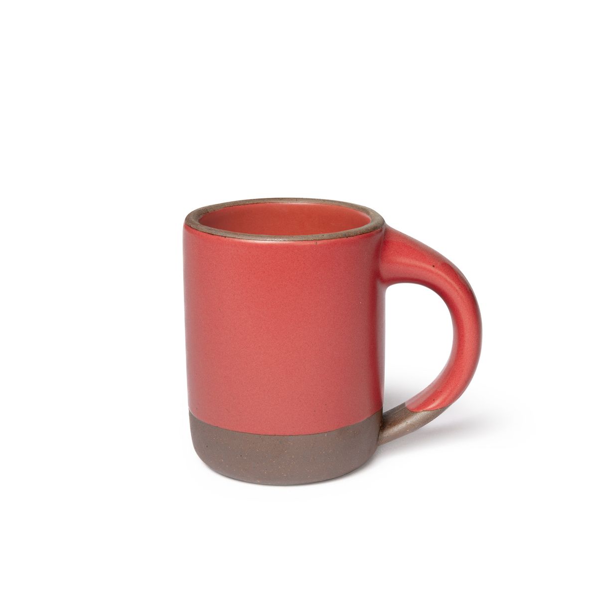 A medium sized ceramic mug with handle in a bold red color featuring iron speckles and unglazed rim and bottom base.