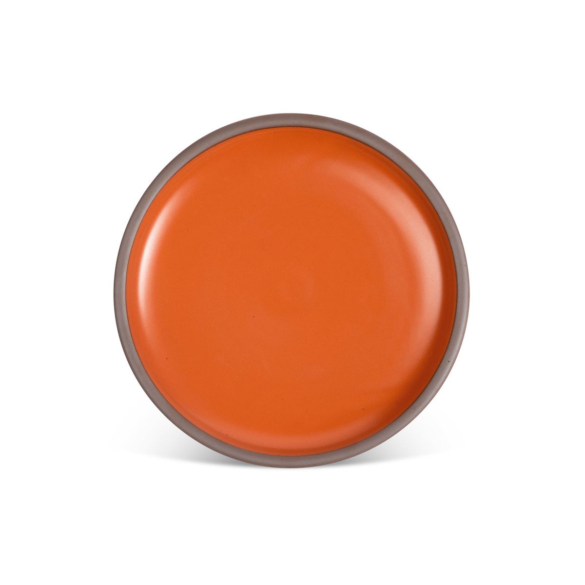A dinner sized ceramic plate in a bold orange color featuring iron speckles and an unglazed rim