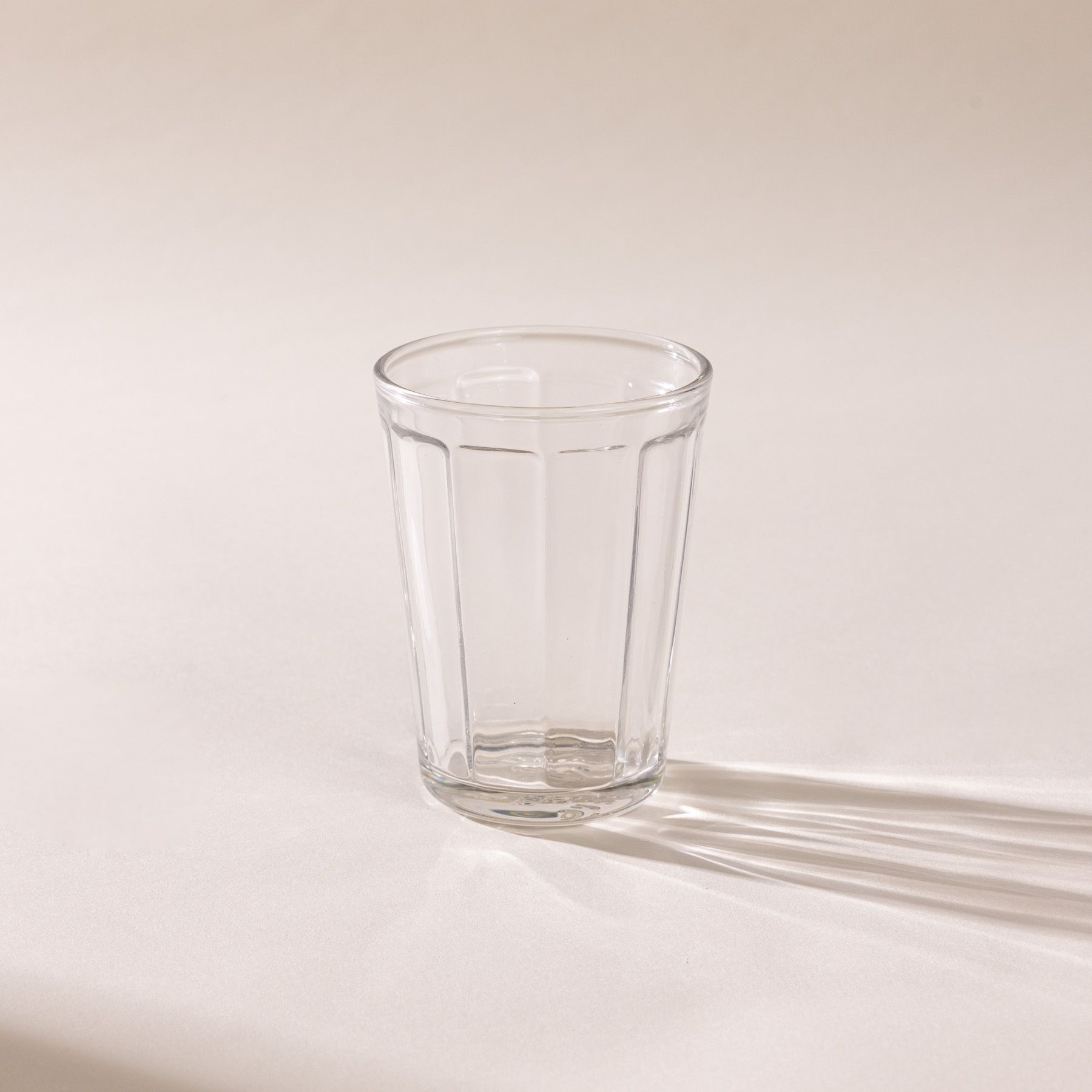 A medium diner-style glass that tapers to be wider at the top