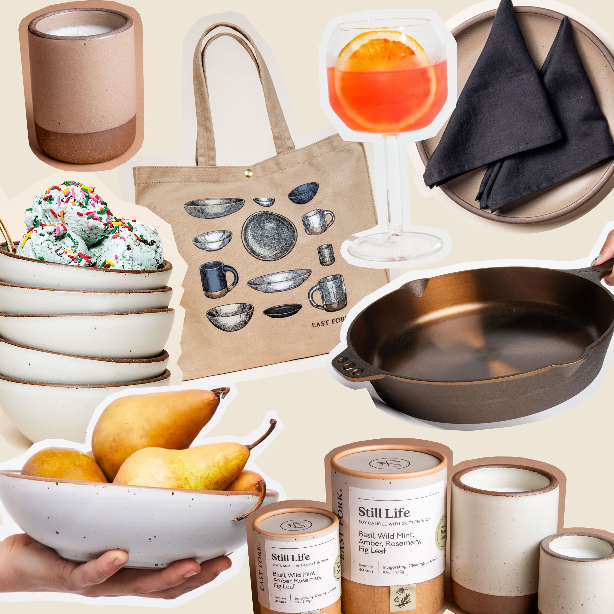 A collage-style photo of different cut out items like candles, a skillet, bowls, napkins, glassware and more.