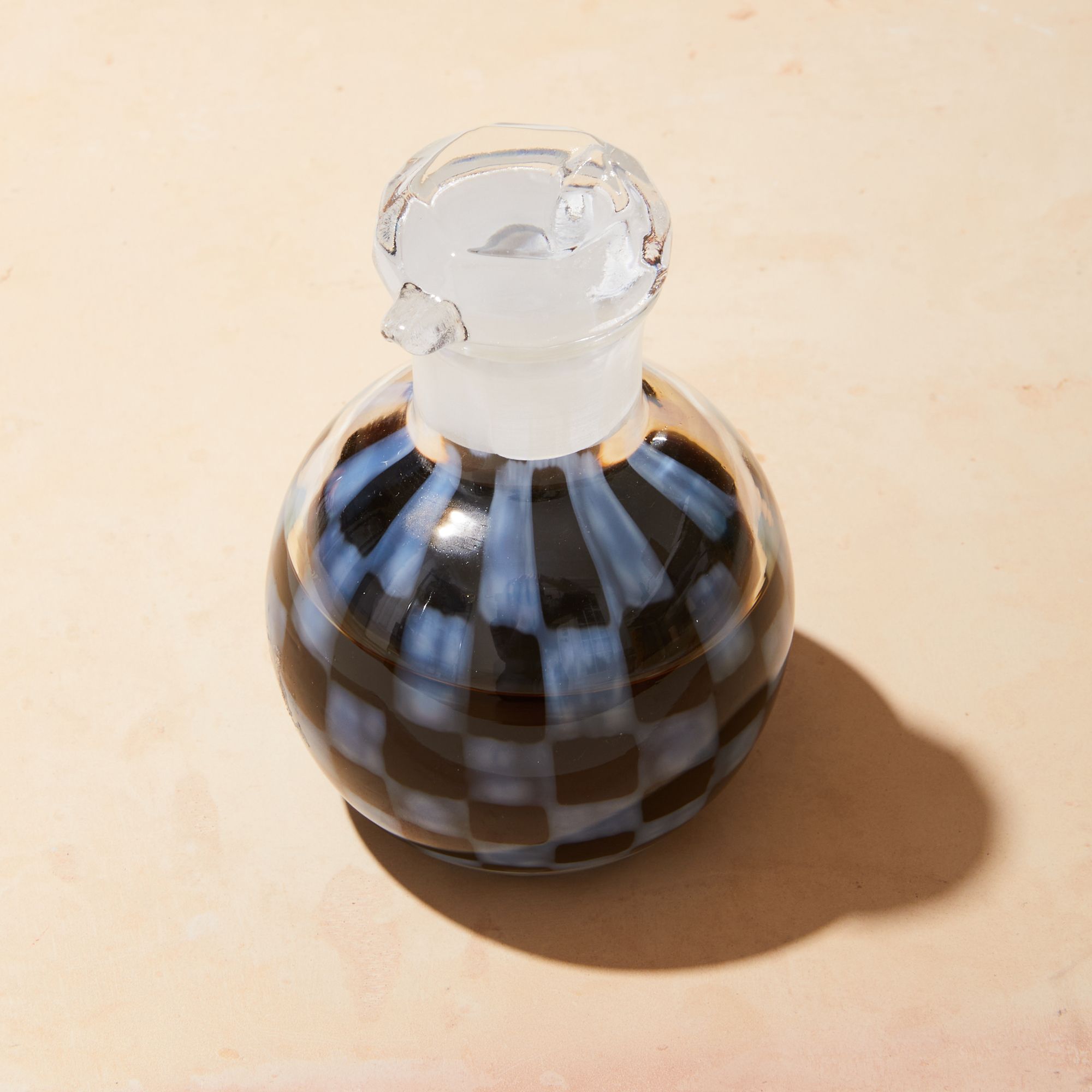 Round glass soy sauce holder with checkered pattern