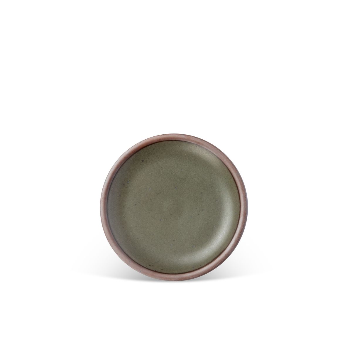 A dessert sized ceramic plate in an earthy green color featuring iron speckles and an unglazed rim