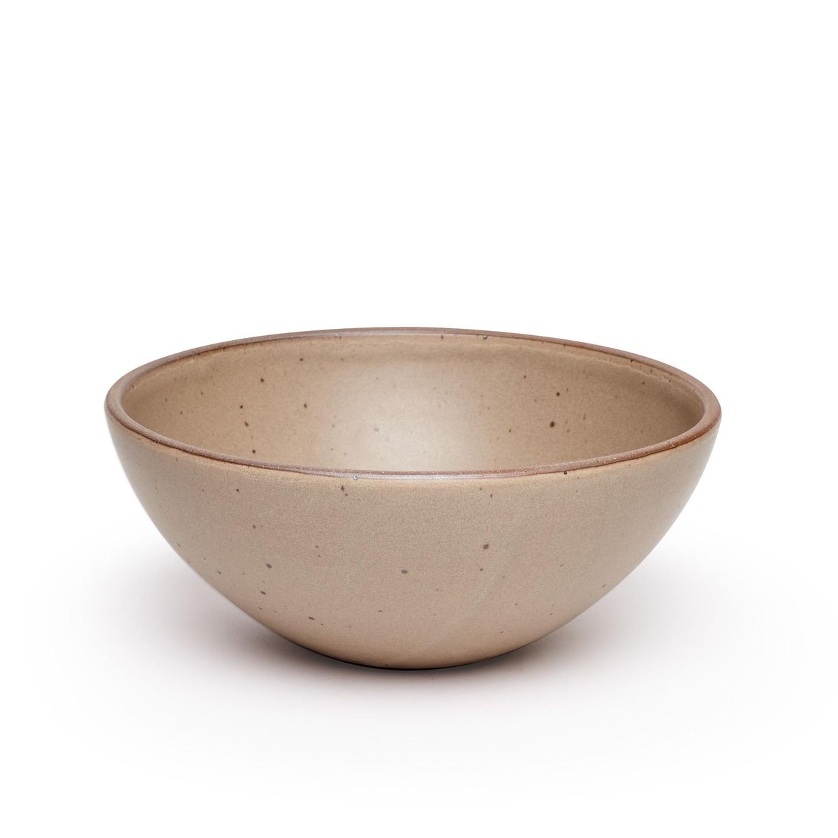 A large ceramic mixing bowl in a warm pale brown color featuring iron speckles and an unglazed rim