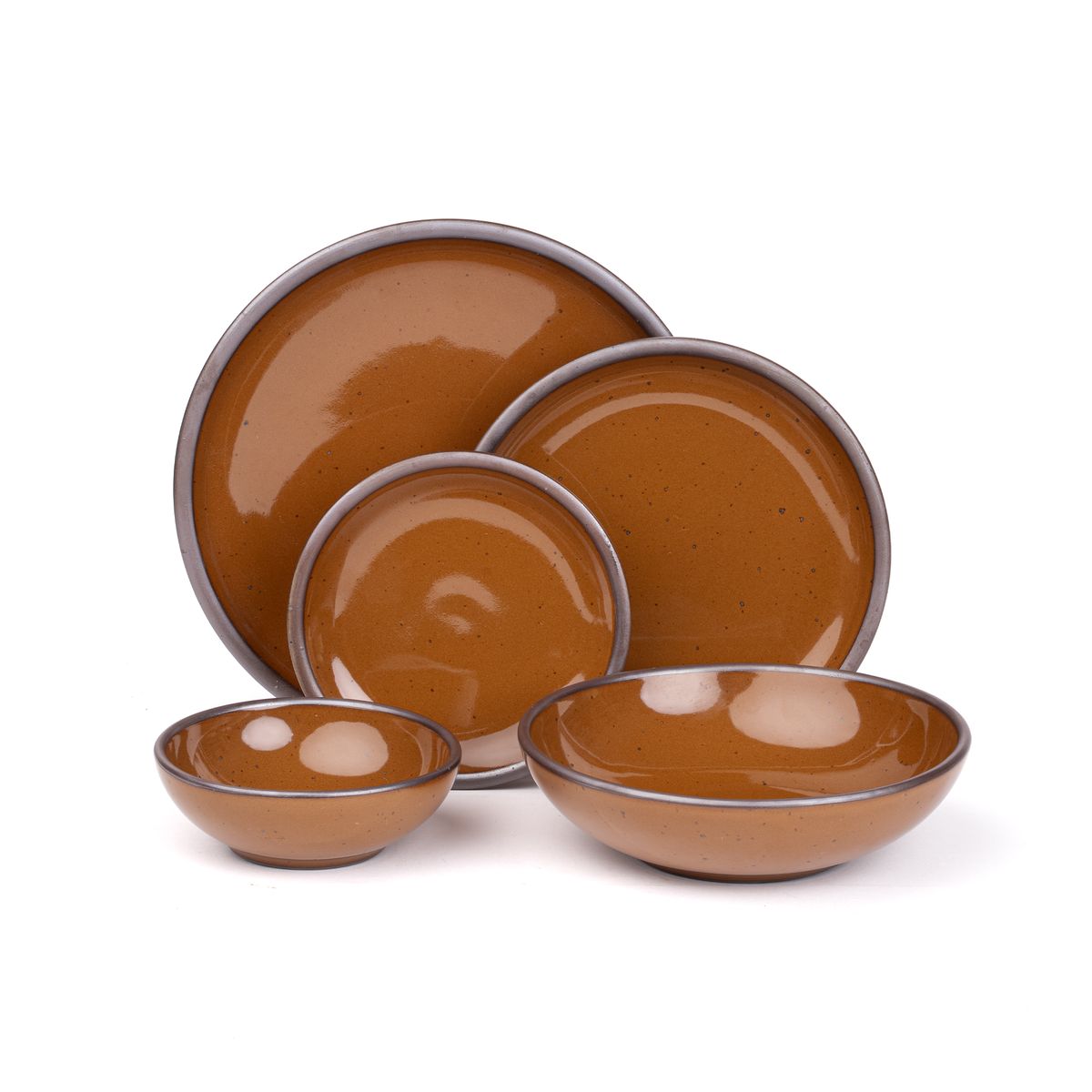 A breakfast bowl, everyday bowl, cake plate, side plate and dinner plate paired together in a glossy caramel brown color featuring iron speckles