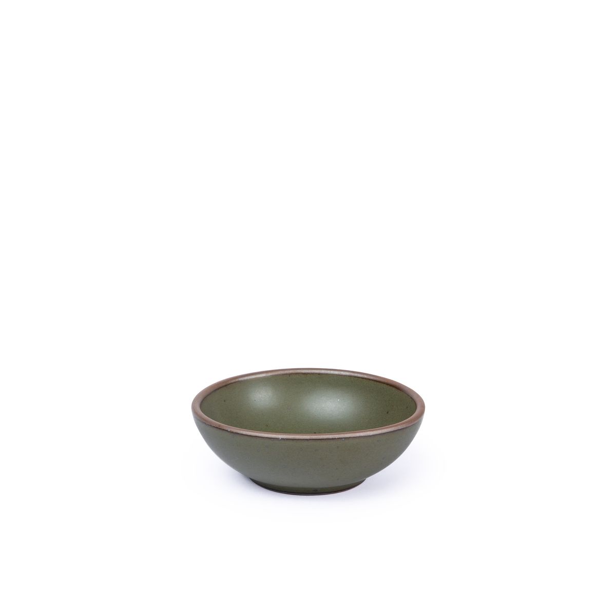 A small shallow ceramic bowl in an earthy green color featuring iron speckles and an unglazed rim