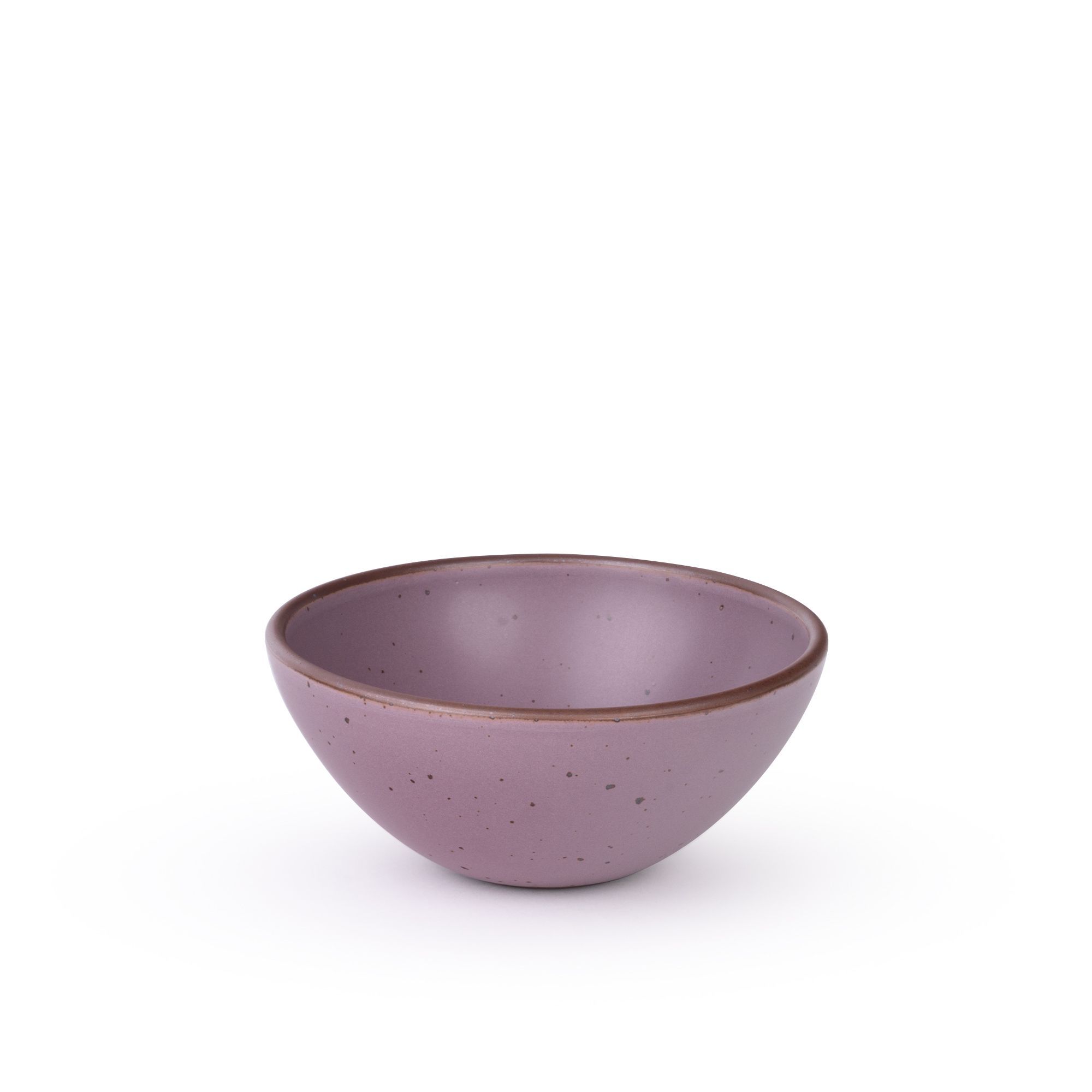 A medium rounded ceramic bowl in a soft mauve purple color featuring iron speckles and an unglazed rim