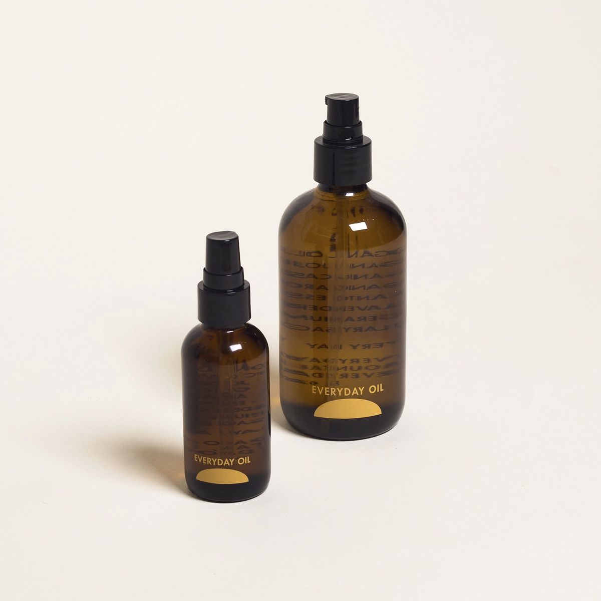 One small and one large bottle of Everyday Oil