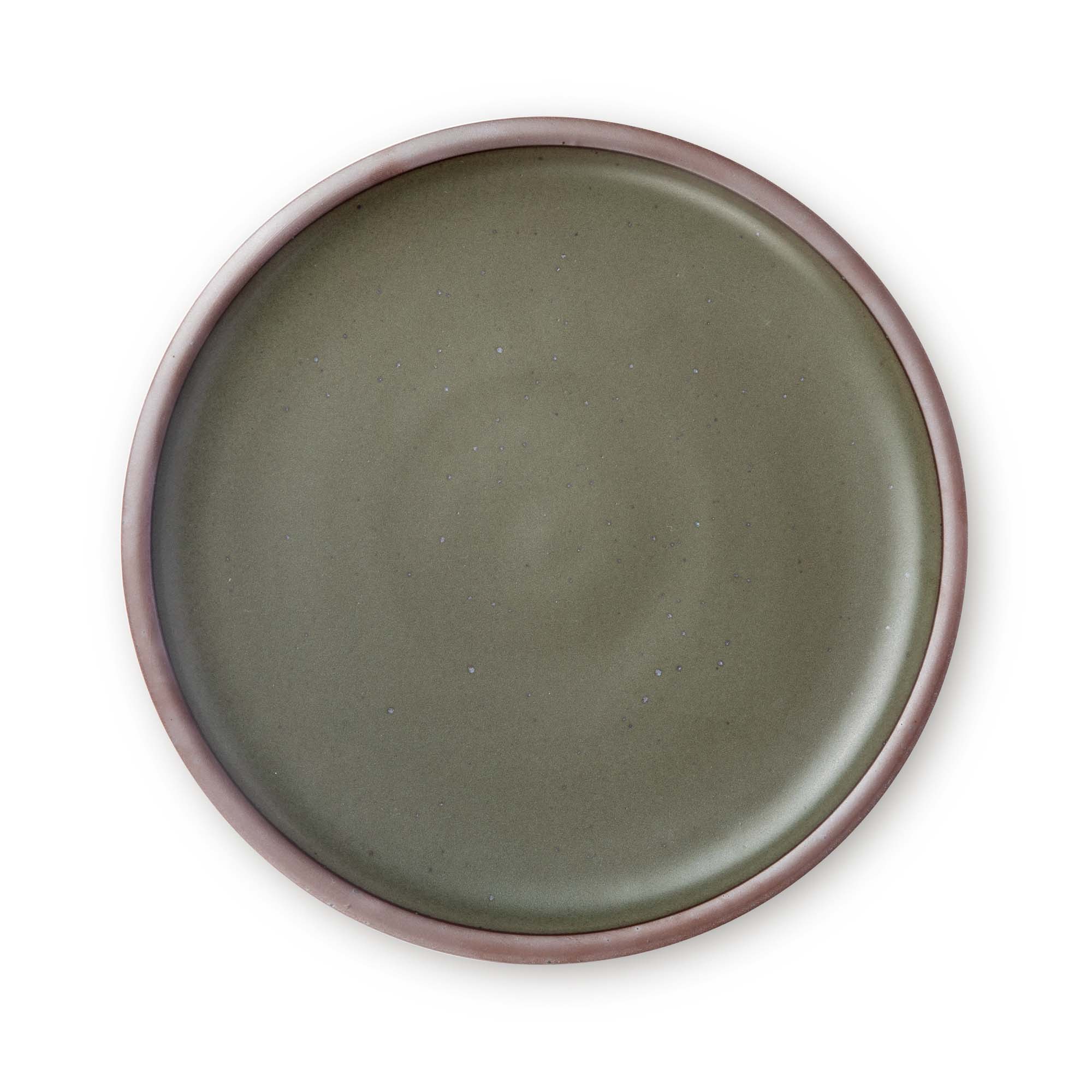 A large ceramic platter in a forest green color featuring iron speckles and an unglazed rim.