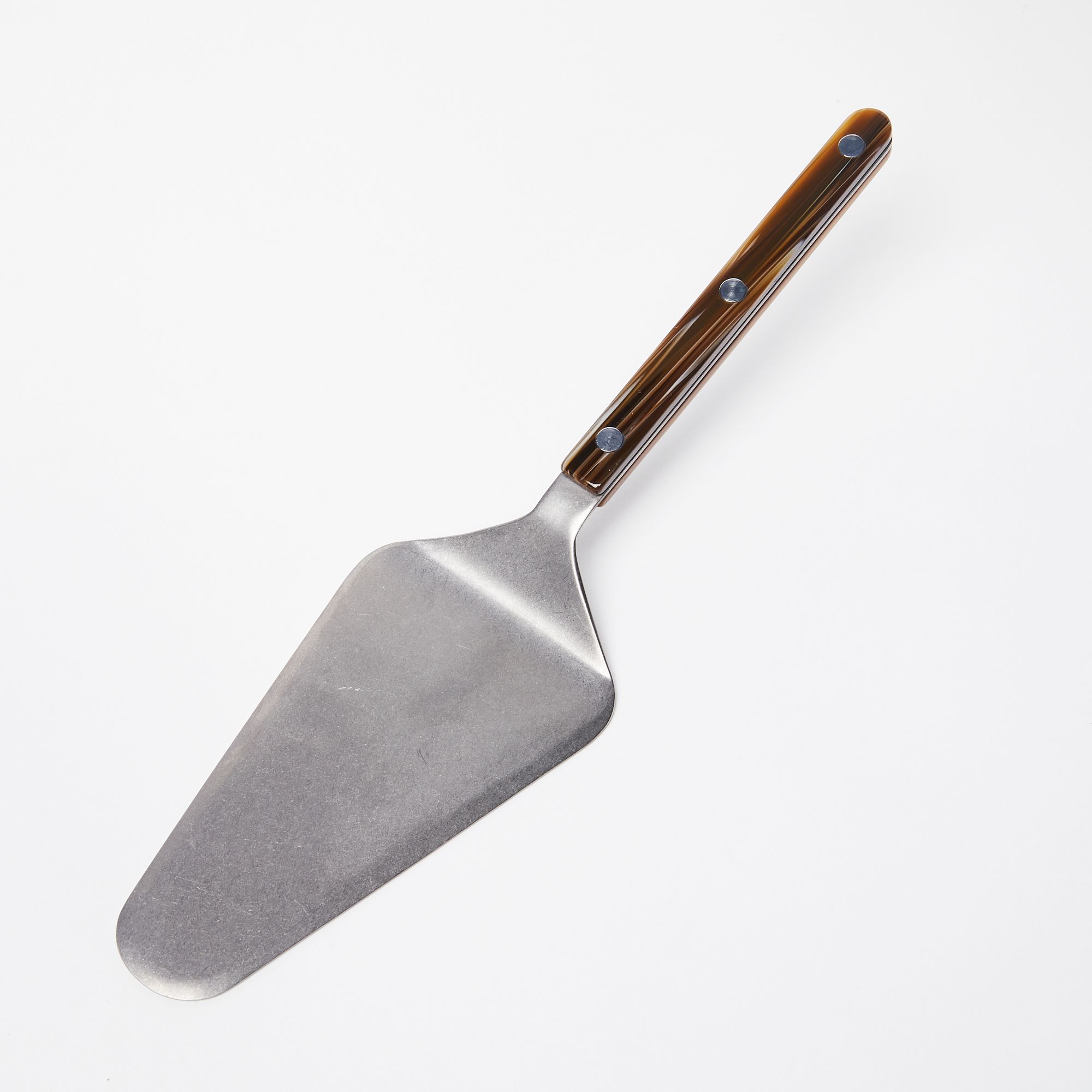 Silver Pie Server with a glossy brown handle with 3 silver circles on it.