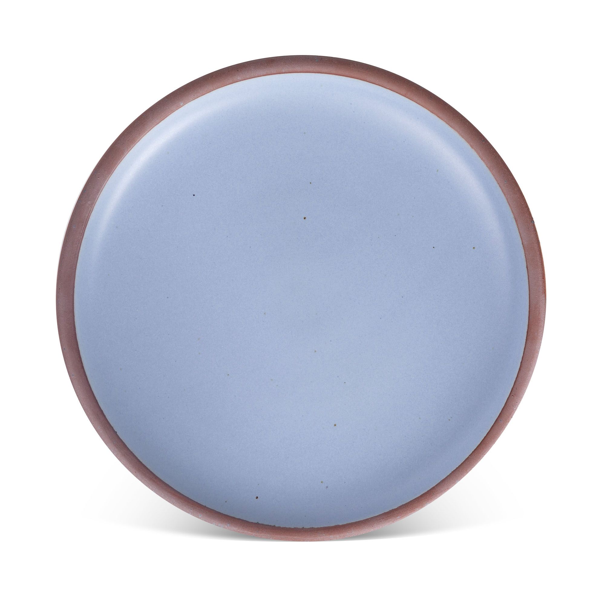 A large ceramic platter in a periwinkle color featuring iron speckles and an unglazed rim