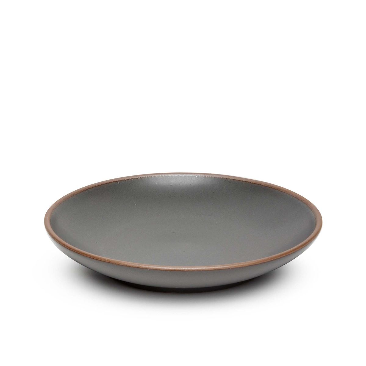 A large ceramic plate with a curved bowl edge in a cool, medium grey color featuring iron speckles and an unglazed rim.