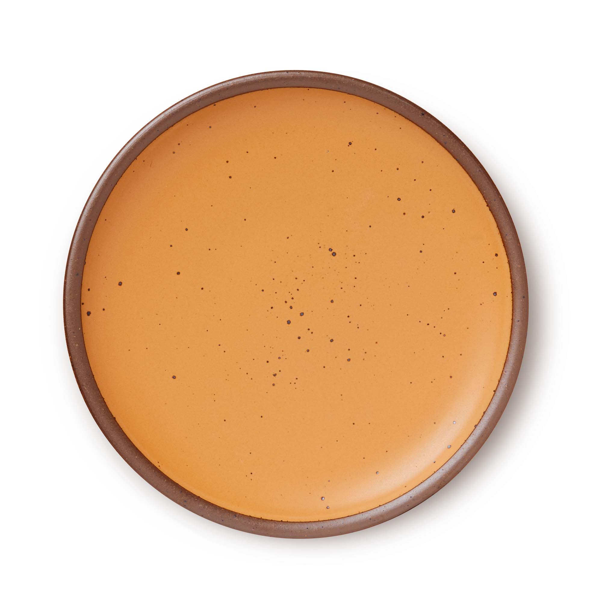 A large ceramic platter in a muted warm orange color featuring iron speckles and an unglazed rim.