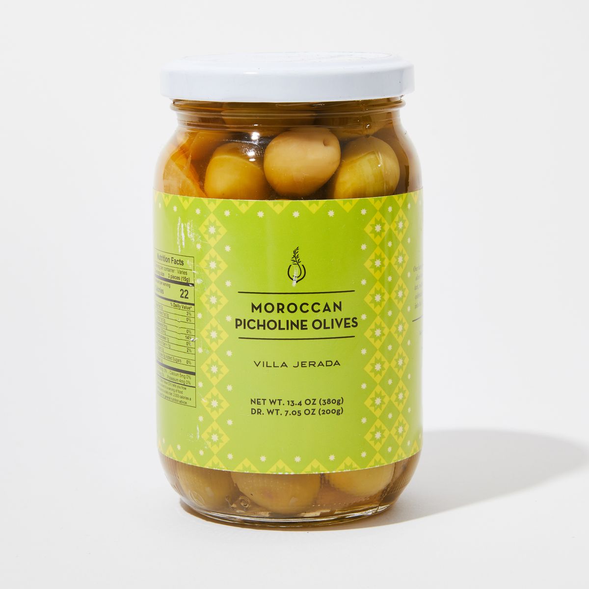 Clear jar of olives in liquid with green label with the name "Moroccan Picholine Olives"