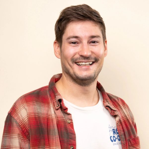 Headshot of Travis M.